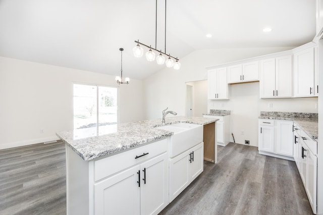 7349 Providence, Edwardsville, IL 62025 - kitchen featuring lofted ceiling, a sink, a chandelier, wood finished floors, and a center island with sink