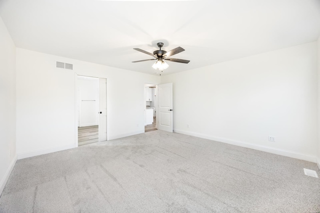 7349 Providence, Edwardsville, IL 62025 - empty room featuring carpet, baseboards, and a ceiling fan