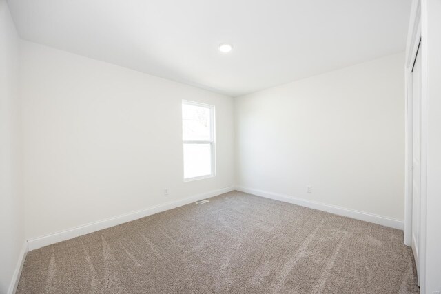 7349 Providence, Edwardsville, IL 62025 - spare room featuring carpet floors, baseboards, and recessed lighting