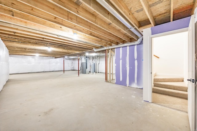 7349 Providence, Edwardsville, IL 62025 - unfinished basement featuring heating unit and stairway