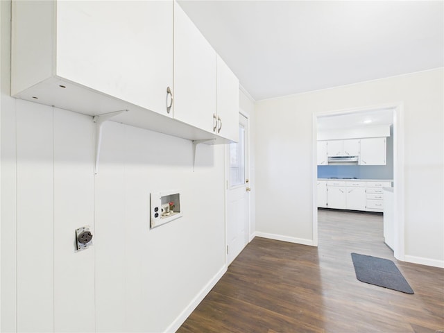clothes washing area with cabinet space, hookup for a washing machine, baseboards, and dark wood-style flooring