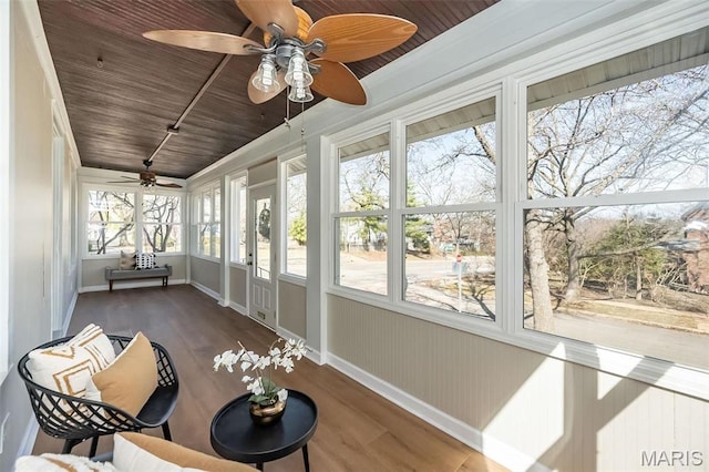 7642 Westmoreland Ave, Saint Louis, MO 63105 - sunroom / solarium featuring ceiling fan, baseboards, wood finished floors, and wooden ceiling