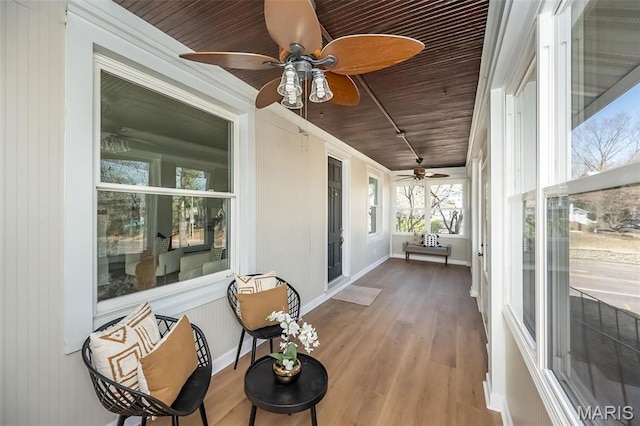 7642 Westmoreland Ave, Saint Louis, MO 63105 - sunroom with ceiling fan