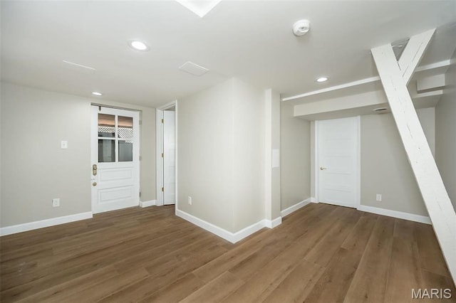 7642 Westmoreland Ave, Saint Louis, MO 63105 - spare room with wood finished floors, recessed lighting, baseboards, and a smoke detector