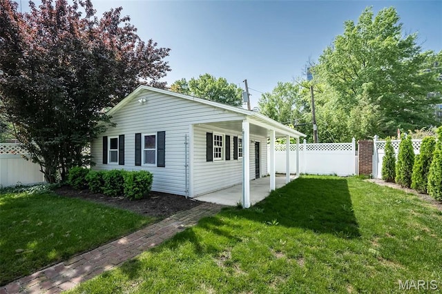 7642 Westmoreland Ave, Saint Louis, MO 63105 - view of property exterior with a patio