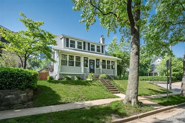 7642 Westmoreland Ave, Saint Louis, MO 63105 - view of front of property featuring a chimney and stairway