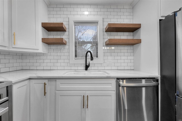 470 Saint Paul Dr, New Madrid, MO 63869 - kitchen with open shelves, appliances with stainless steel finishes, a sink, and white cabinets