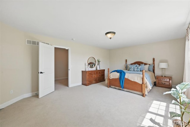 bedroom featuring carpet flooring and baseboards