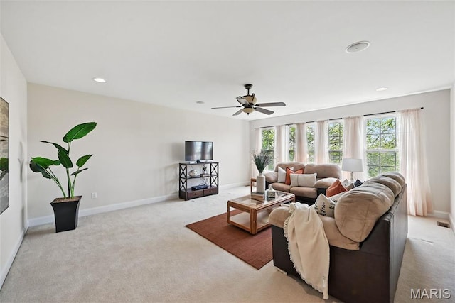living room with carpet, a ceiling fan, baseboards, and recessed lighting