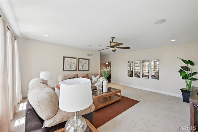 carpeted living room with ceiling fan, baseboards, healthy amount of natural light, and recessed lighting