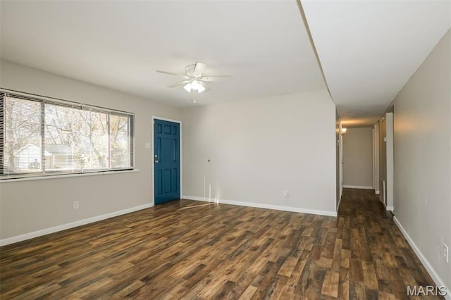 1235 Flicker Dr, Florissant, MO 63031 - empty room with a ceiling fan and dark wood-type flooring