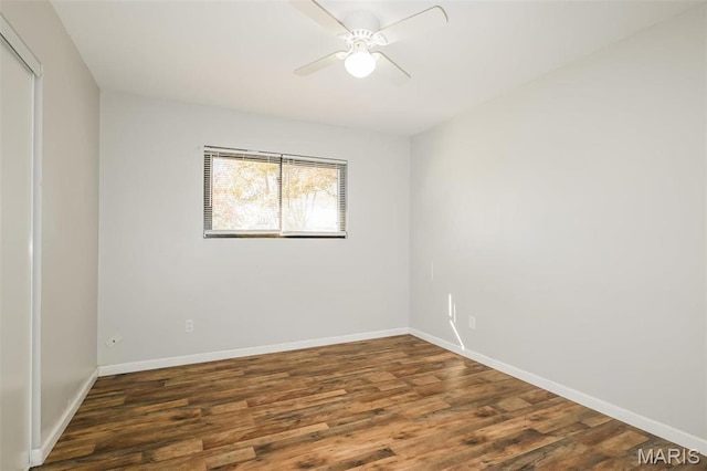 1235 Flicker Dr, Florissant, MO 63031 - spare room featuring wood finished floors and ceiling fan