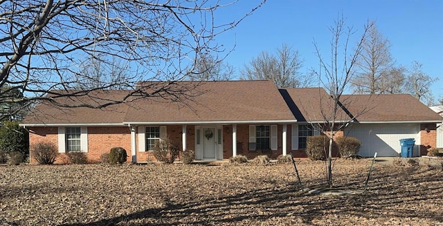 810 E Cedar St, Bertrand, MO 63823 - single story home with brick siding and an attached garage