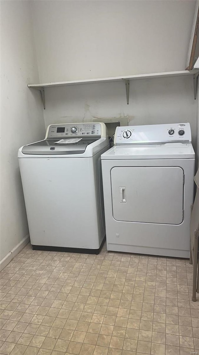 810 E Cedar St, Bertrand, MO 63823 - washroom with separate washer and dryer and baseboards