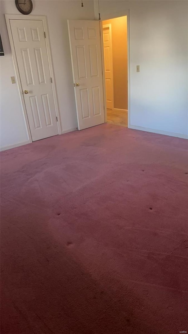 810 E Cedar St, Bertrand, MO 63823 - carpeted spare room with baseboards