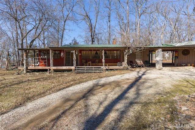 631 Columbia Dr, Bismarck, MO 63624 - single story home featuring dirt driveway and covered porch