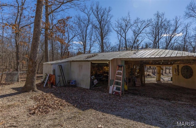 631 Columbia Dr, Bismarck, MO 63624 - view of pole building featuring a carport