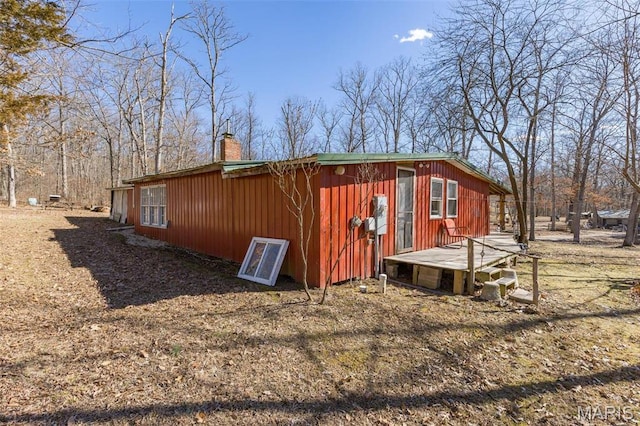 631 Columbia Dr, Bismarck, MO 63624 - view of side of home with a chimney