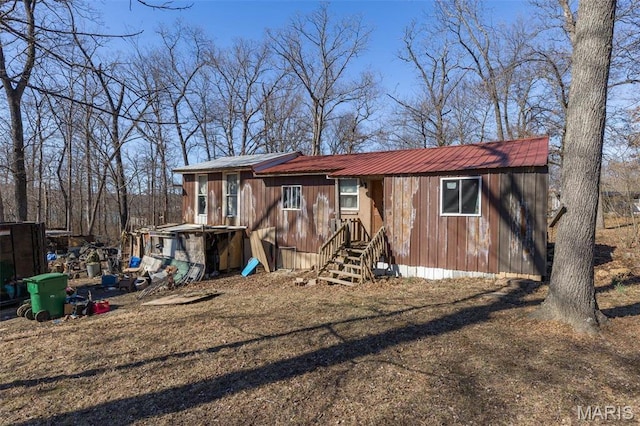 631 Columbia Dr, Bismarck, MO 63624 - rear view of property with metal roof