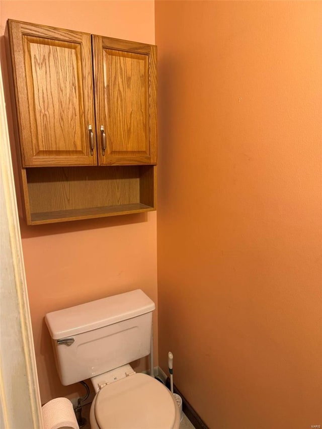 bathroom featuring toilet