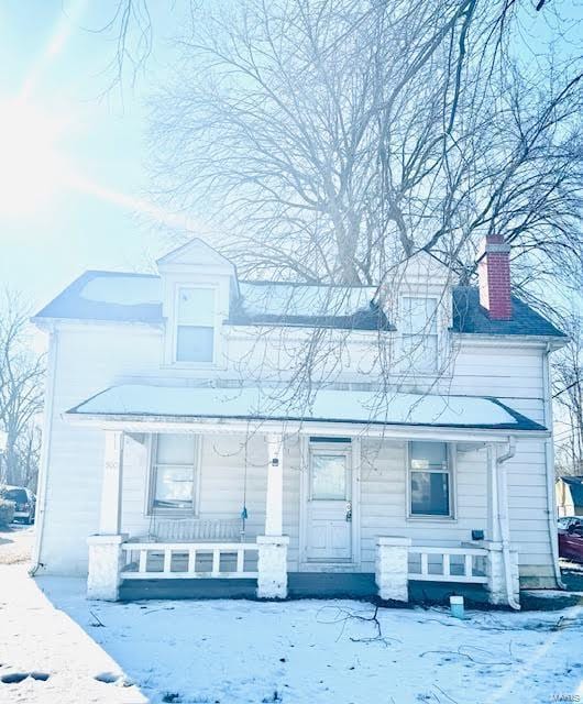 500 S 29th St, Belleville, IL 62226 - view of front of property featuring a porch and a chimney
