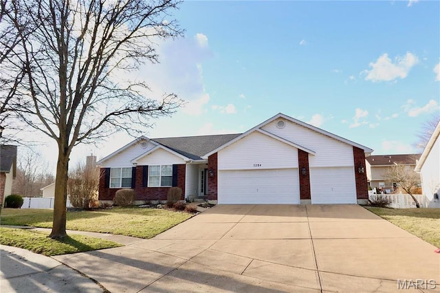5284 Summer Cir, Imperial, MO 63052 - ranch-style home with brick siding, a garage, and driveway