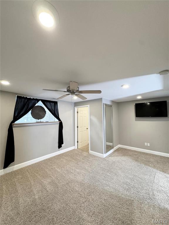 5284 Summer Cir, Imperial, MO 63052 - below grade area featuring carpet, a ceiling fan, baseboards, and recessed lighting