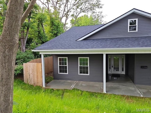 104 Ash St, Bonne Terre, MO 63628 - rear view of house featuring roof with shingles and a patio area