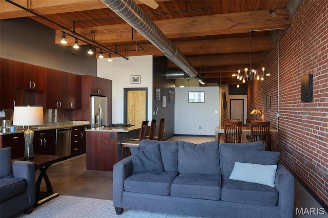 1015 Washington Ave Unit 609, Saint Louis, MO 63101 - living area with brick wall, concrete flooring, a chandelier, wood ceiling, and beam ceiling