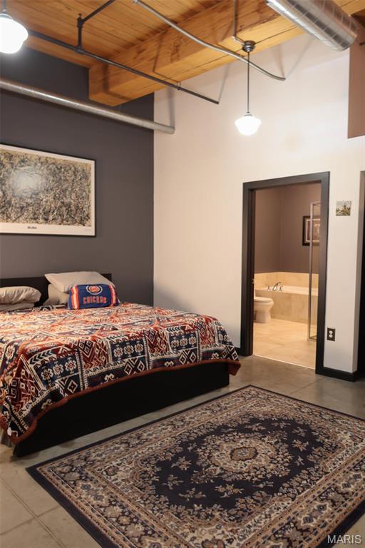 1015 Washington Ave Unit 609, Saint Louis, MO 63101 - tiled bedroom with ensuite bathroom