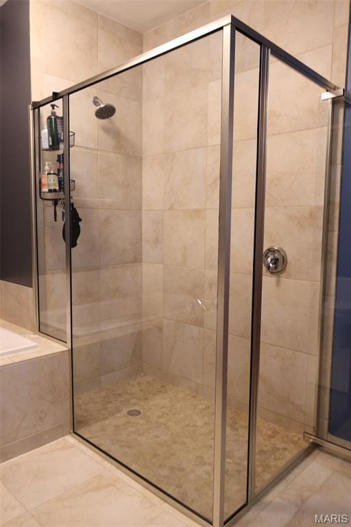 1015 Washington Ave Unit 609, Saint Louis, MO 63101 - full bathroom featuring a stall shower and a bath