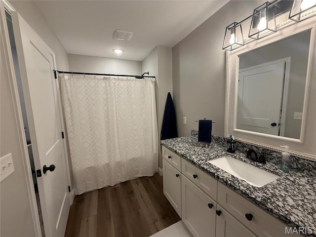 379 Lakeview Cpe, Girardeau, MO 63701 - full bathroom featuring wood finished floors and vanity