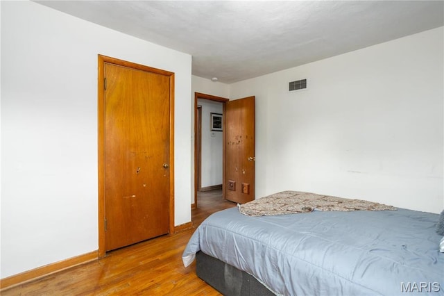 4 New Sugar Creek Rd, Fenton, MO 63026 - bedroom featuring wood finished floors and baseboards