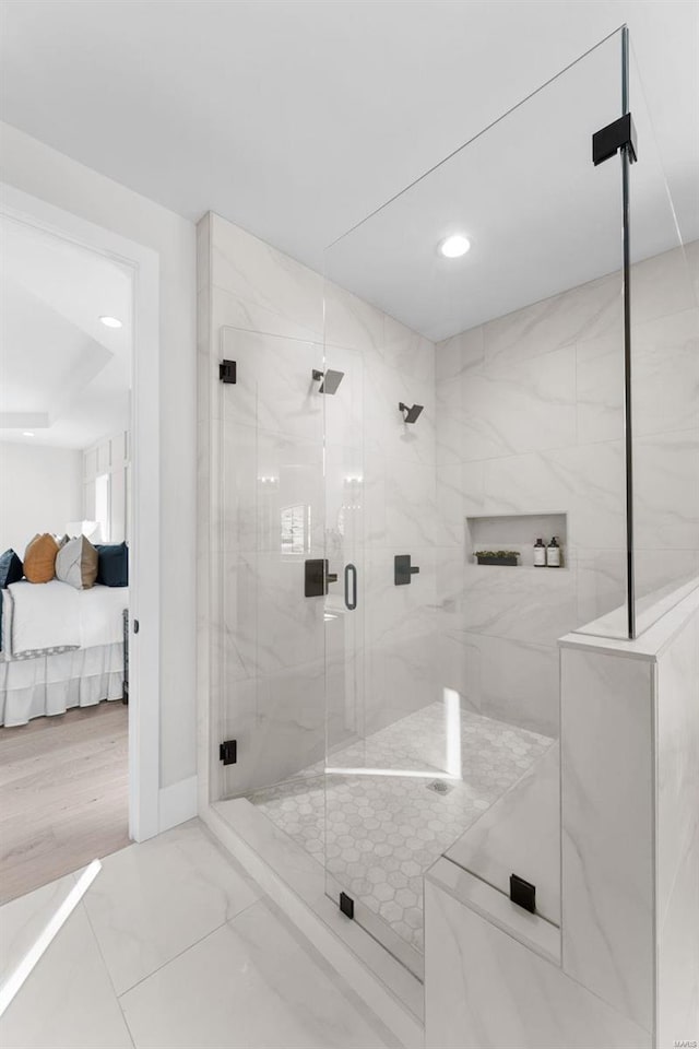 16908 Lewis Spring Farms Rd, Wildwood, MO 63005 - ensuite bathroom featuring a marble finish shower, recessed lighting, and marble finish flooring