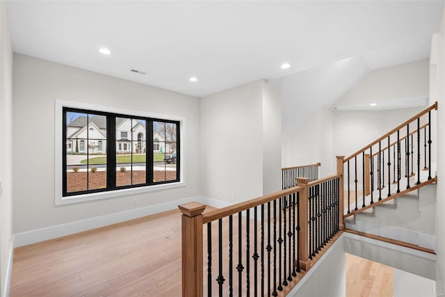 16908 Lewis Spring Farms Rd, Wildwood, MO 63005 - stairway featuring wood finished floors, baseboards, and recessed lighting