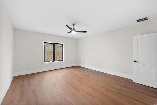 16908 Lewis Spring Farms Rd, Wildwood, MO 63005 - empty room with ceiling fan, wood finished floors, and baseboards