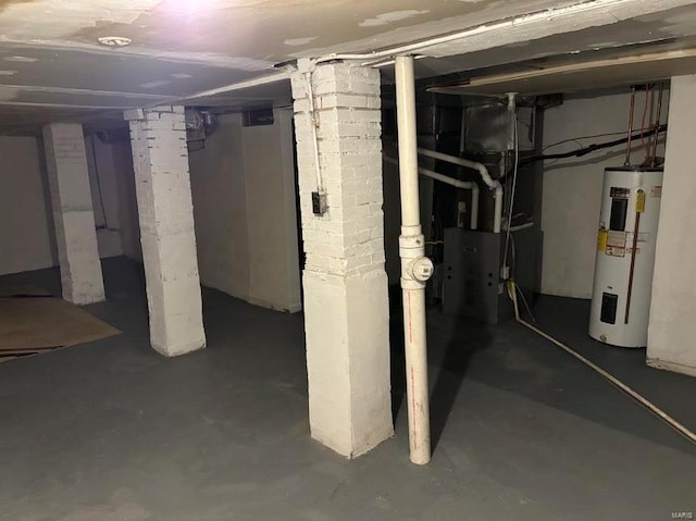 4172 Delmar Blvd, Saint Louis, MO 63108 - unfinished below grade area featuring water heater and heating unit