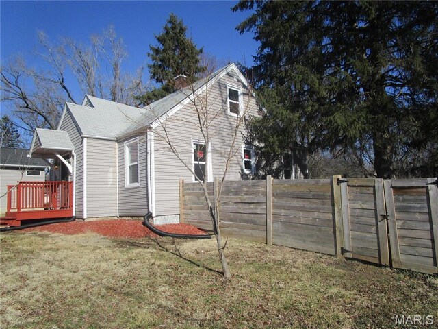 7 Pineview Ln, Collinsville, IL 62234 - view of property exterior with a deck and a gate