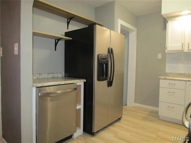 7 Pineview Ln, Collinsville, IL 62234 - kitchen featuring stainless steel appliances, open shelves, white cabinets, light wood-style flooring, and baseboards