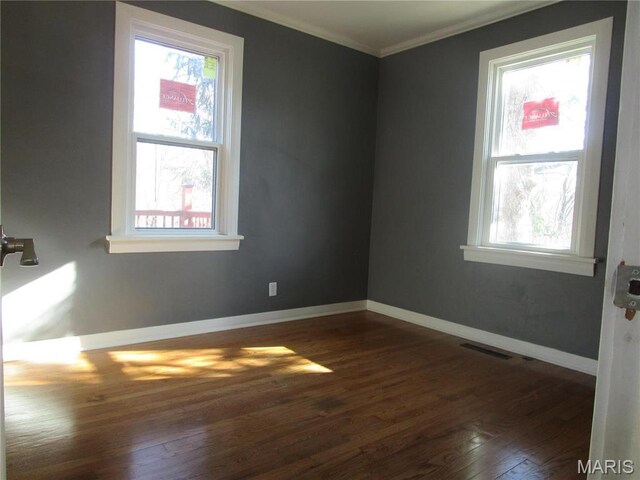 7 Pineview Ln, Collinsville, IL 62234 - empty room with crown molding, dark wood-style floors, and baseboards