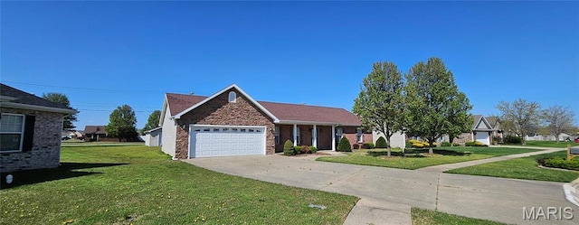 ranch-style home featuring an attached garage, a front yard, stone siding, and driveway