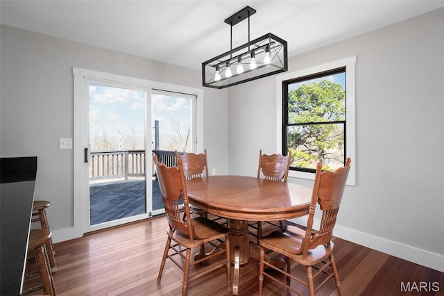 719 Green Ridge Dr, Catawissa, MO 63015 - dining space with wood finished floors and baseboards