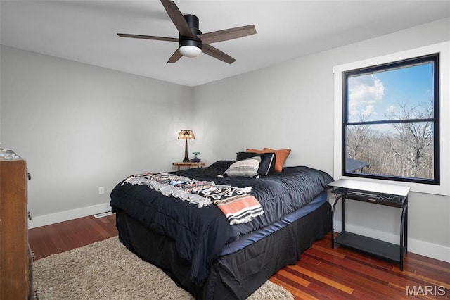719 Green Ridge Dr, Catawissa, MO 63015 - bedroom with wood finished floors, baseboards, and a ceiling fan