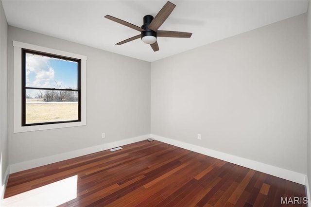 719 Green Ridge Dr, Catawissa, MO 63015 - spare room featuring baseboards, a ceiling fan, and wood finished floors