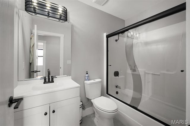 719 Green Ridge Dr, Catawissa, MO 63015 - full bath featuring vanity, toilet, combined bath / shower with glass door, and marble finish flooring