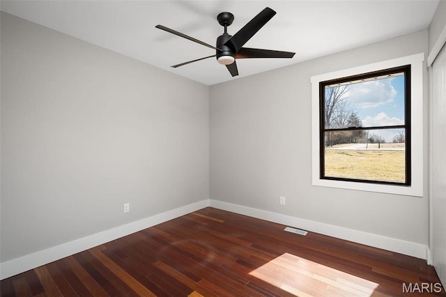719 Green Ridge Dr, Catawissa, MO 63015 - empty room with baseboards, a ceiling fan, and wood finished floors