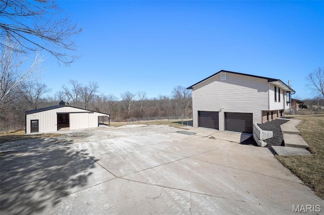 719 Green Ridge Dr, Catawissa, MO 63015 - view of property exterior with concrete driveway