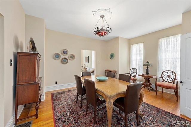18 Georgia Ave, Saint Louis, MO 63135 - dining room with light wood finished floors and baseboards