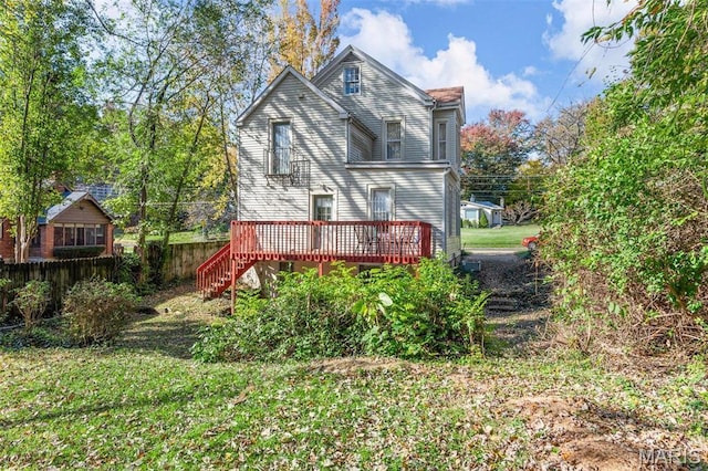 18 Georgia Ave, Saint Louis, MO 63135 - rear view of house with a wooden deck, fence, and stairs