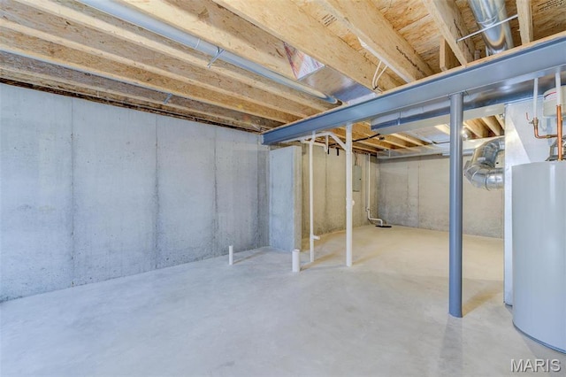 unfinished basement featuring water heater